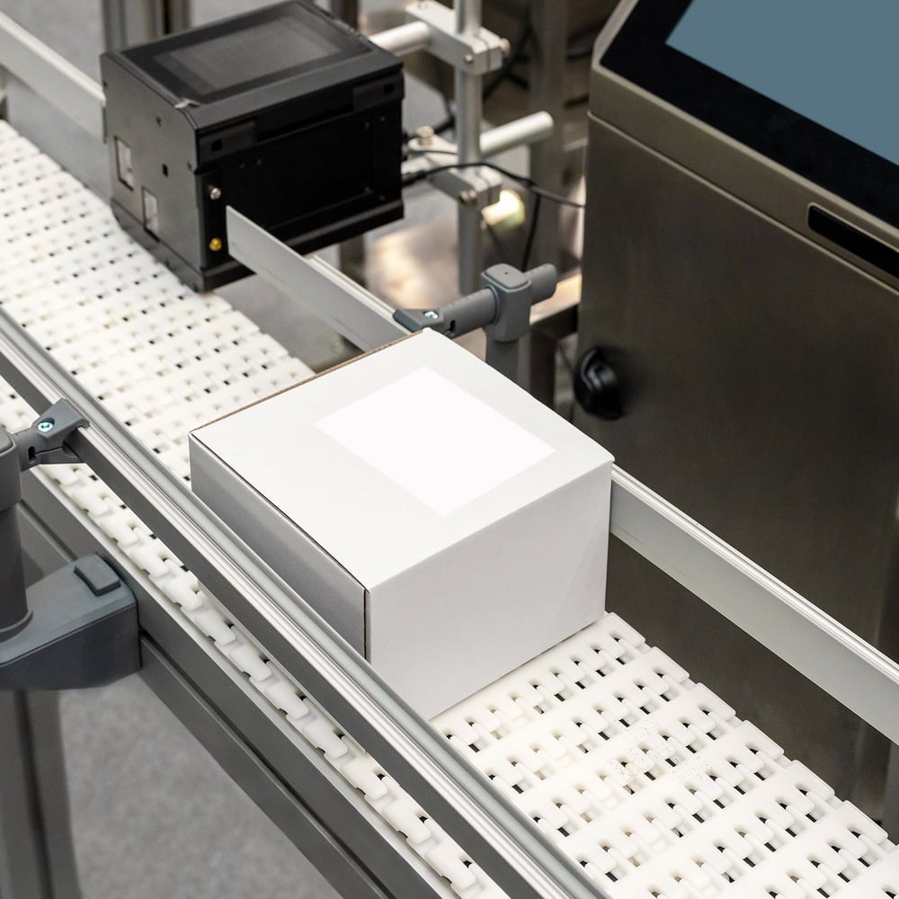 white box on conveyor