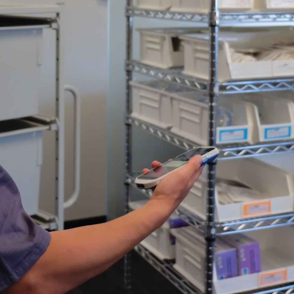 medical professional scanning product with smartphone 1200x1200