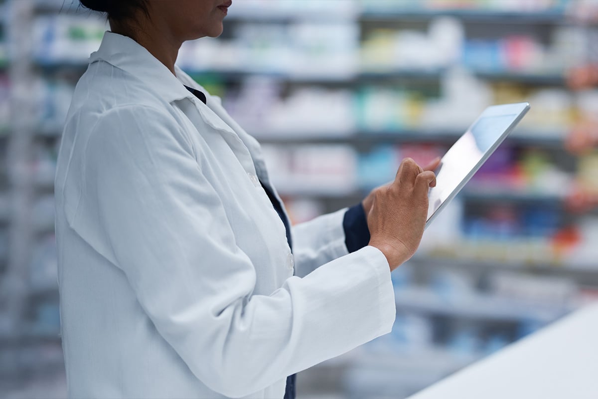 pharmacist using digital tablet